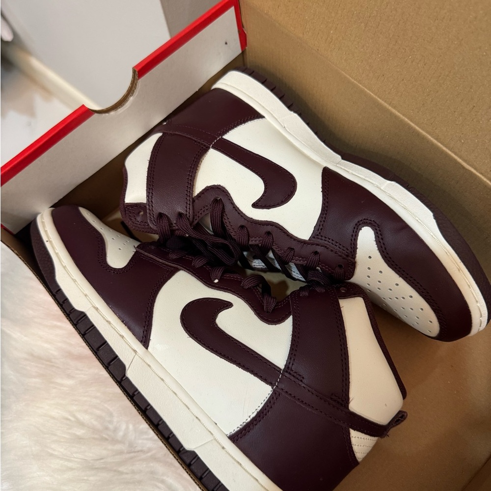 Nike Woman’s Burgundy and White Sneakers